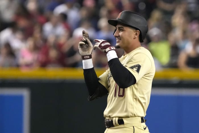 Josh Rojas celebrates at second base.